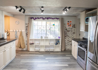 entry way and kitchen at blue horse after school care in elk ridge, utah